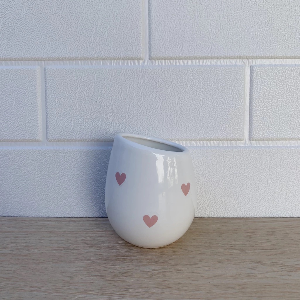 Mate de ceramica corazones rosa