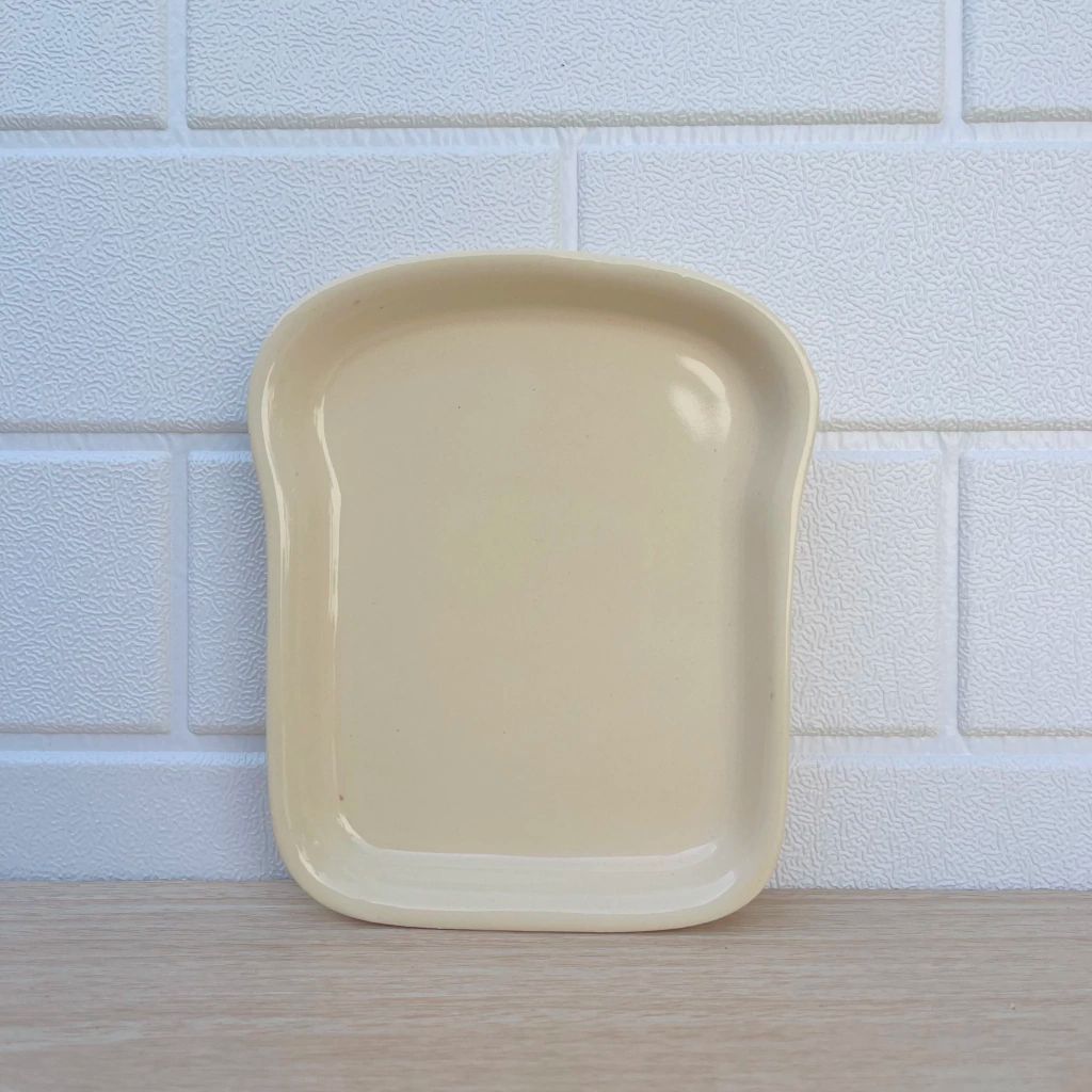 Tostada de ceramica beige