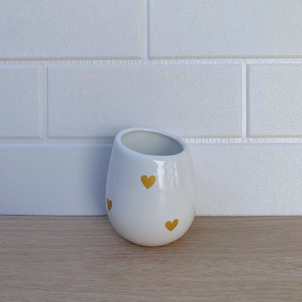 Mate de ceramica corazones dorado